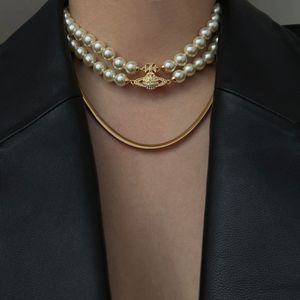 Créateur de mode bijoux planète diamant bracelet aimant fermoir collier de perles saturne double couche tour de cou pour femmes version haute chaîne de clavicule accessoire haut de gamme