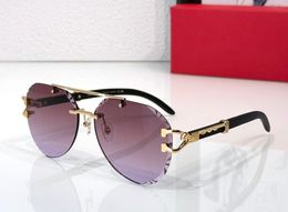 Gafas de sol para hombres de diseño de moda 0532 Luxury Vintage Pilot Metal Gafas sin borde grabado Diseño de lentes grabados GUELES PhotoChromic Anti-Ullerraviolet viene con caja