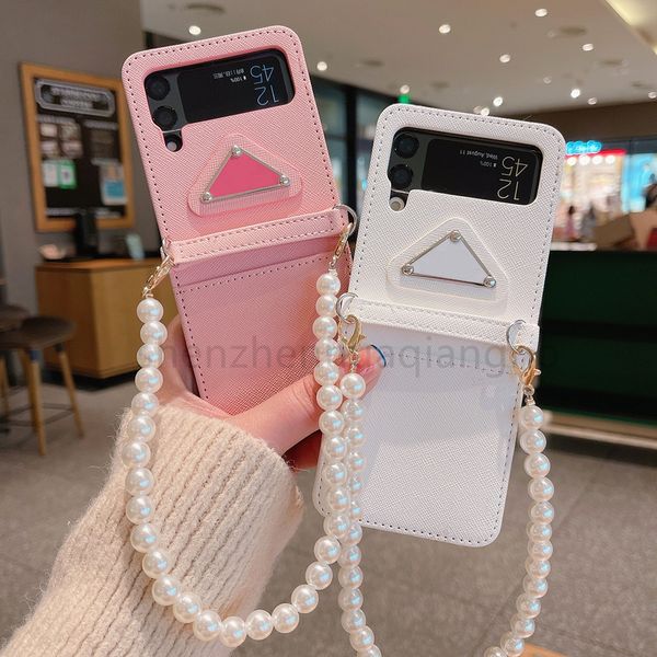 Étuis de téléphone de créateurs de mode pour Samsung Galaxy Z Flip 4 3 Étui en cuir de luxe avec bracelet en chaîne de perles pour femmes pour Galaxy Z Flip2 1 ZFlip3 5G