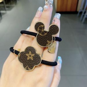 Diseñador de moda Impreso círculo de pelo de dibujos animados cowhard estilo retro media bola pelo cola de caballo banda para el cabello Maiden Elástico HairJewelry Accesorios para el cabello