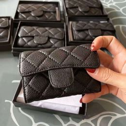 Diseñador de moda Bolsos de cuero real Monedero Mujeres Diseñador de lujo Cuero de vaca Pequeña billetera Negro Simple Mini Titular de la tarjeta Embrague para mujeres C4328