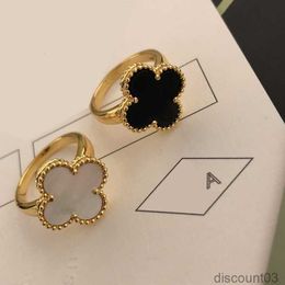 Bagues de créateurs de mode pour femmes, bague de trèfle à quatre feuilles, fleur de nacre, longue durée, rétention de couleur, cadeau de rassemblement social, bon cadeau