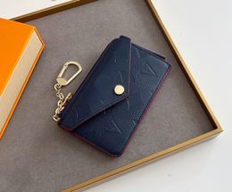 Portefeuilles de créateurs de mode sacs à main de luxe Recto Verso lettre de fleur en relief de haute qualité hommes femmes porte-cartes de crédit dames pochette d'argent courte avec boîte
