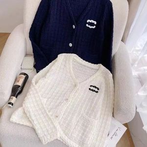 Diseñador de moda para mujeres tops tees damas fit de punto de punto Slim Knit Cardigan Top Knits Tees Women Cardigan Cardigan con cremalleras Estilo corto Lady Jumpers Diseño S-XL