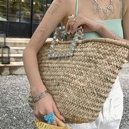 Fashion diamanten hanteren rattan basket tas rieten geweven vrouwen handtassen causaal zomerstrand grote emmerzakken grote bali rietje portemonnee 240419