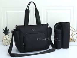 Bolsas de pañales de moda, bolsos de mano para mujer, bolso de nailon de gran capacidad para mamá, bolso de hombro de cuero PU para mujer, bolsos de mano de Color sólido