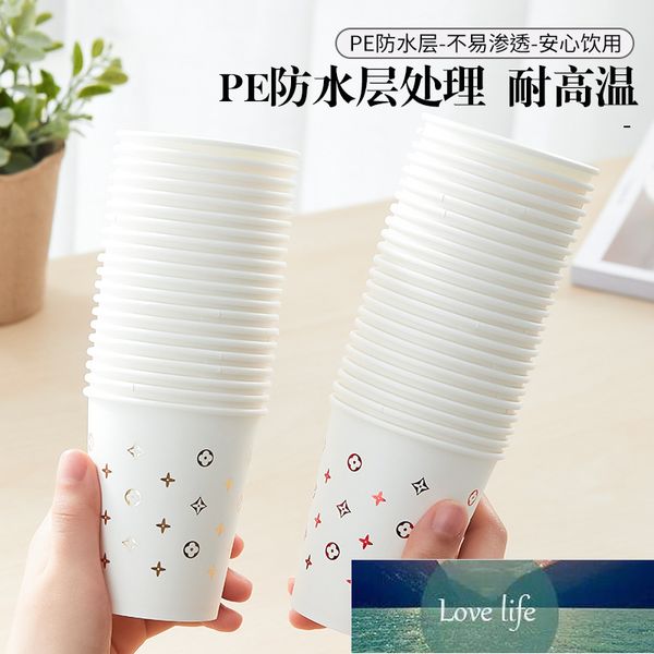 Taza de papel desechable de moda Taza de agua comercial de oficina engrosada Taza de té al por mayor para el hogar Material de bronceado de alta gama Taza de bebidas calientes