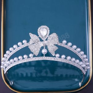 Mode elegante prinses zilveren kleur wit kristal tiara kroon meisjes strass bowknot kroon haarjurk accessoires