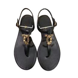 Moda elegante para mujer sandalias de cuero diseñador verano chanclas zapatos planos de playa