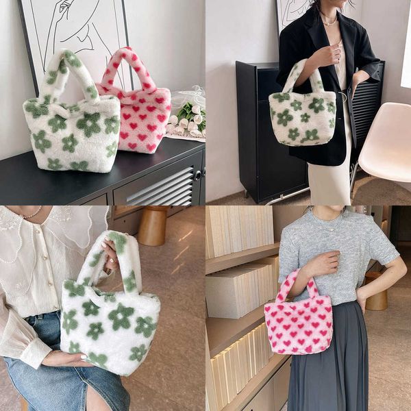 Bolsos de noche de moda Bolso de felpa popular coreano de alta gama para mujeres en primavera Bolso estampado de moda Bolso de mano informal y versátil 230828