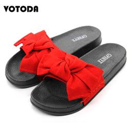 Mode Plat Arc Pantoufles Pour Femmes Chaussures D'été Grand Arc Tongs En Plein Air Bowtie Diapositives Femme Plage Sandales Plus La Taille Chaussures C0330