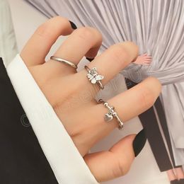 Conjunto de anillos de corazón a la moda, anillos de mariposa Punk para mujeres y niñas, joyería elegante y encantadora de Metal de Color plateado