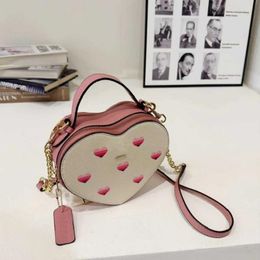 Beaux sacs à bandouliers en forme de coeur pour les femmes po en cuir pU femelle sacs de bandoulière