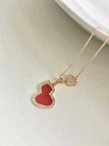 Mode vente chaude Double Hulu collier lumière luxe mince collier bijoux femmes or pull chaîne chaîne os chaîne en gros