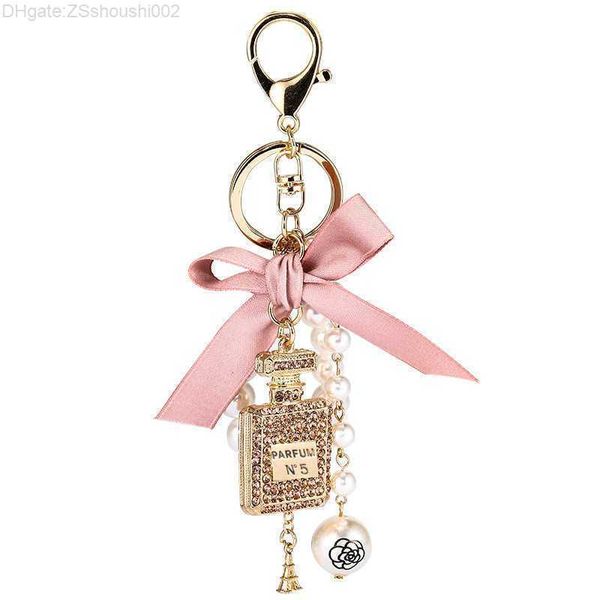 Mode Imitation Perle Bouteille De Parfum Porte-clés Voiture Porte-clés Femmes Sac Charme Accessoires Mignon Arc Chaîne Créative Porte-clés G1019 9WLK