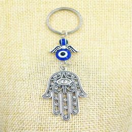 Bijoux fantaisie bleu mauvais œil porte-bonheur Fatima Hamsa main turc mauvais œil charme Protection cintre cristaux voiture Feng Shui porte-clés-1209F