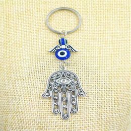 Bijoux fantaisie bleu mauvais œil porte-bonheur Fatima Hamsa main turc mauvais œil charme Protection cintre cristaux voiture Feng Shui porte-clés-12885