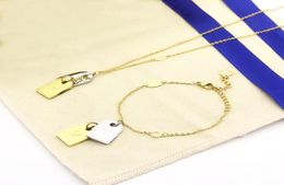 Ensembles de bijoux de mode homme dame femmes orargentcolor métal gravé initiales double pendentif carré nanogramme étiquette collier bracelet7923059
