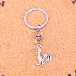 Mode sleutelhanger 21*16 mm kip lul haan hangers diy sieraden auto sleutelhanger ringhouder souvenir voor cadeau