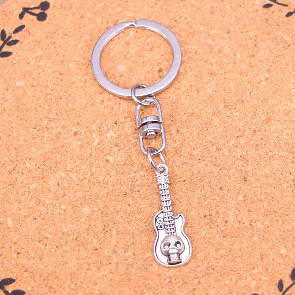 Fashion Keychain 32 * 11 mm Guitare Pendentine Skull Pendentif Diy bijouterie Car Chain-Chain Ring Holder Souvenir pour cadeau