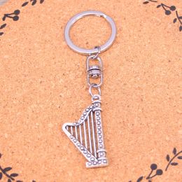 Mode sleutelhanger 40 * 21mm harp muzikale hangers diy sieraden auto sleutelhanger ring houder souvenir voor geschenk