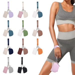 Llavero de moda luln dual bolsillo muñequera bolsillo doble mini bolsita de yoga bolsita para muñequera Cambio de llavero desmontable de almacenamiento