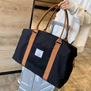 Moda Bolsa de viaje grande Mujeres Cabina Bolsas de asas Bolso Oxford Tela Lona Bolsas de hombro impermeables Mujeres Fin de semana Bolsa de noche 240307