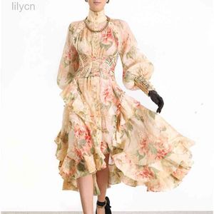 Ligne de mode Vintage femmes robes col montant manches longues lanterne taille haute ceinture volants irrégulière Midi femme