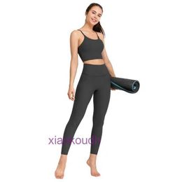 Mode ll-tops sexy women yoga sous-vêtements femelles femme de sport à ajustement serré avec poitrine poitrine slim ajustement sans manches beaux dos séchage rapide et sous-vêtements sains