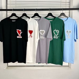 Camisa de tela con logotipo de amor a la moda para hombres y mujeres sueltos con la misma camisa de manga corta informal