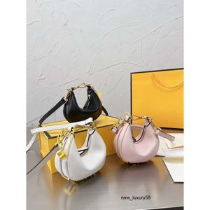 Sac de luxe de mode Mini portefeuilles Designer Graphie Sacs en cuir véritable Croissant Sacs à main Fond Lettre d'or Sac de poignet Chaînes Sangles Sacs à bandoulière Mini Sacs fourre-tout Femmes