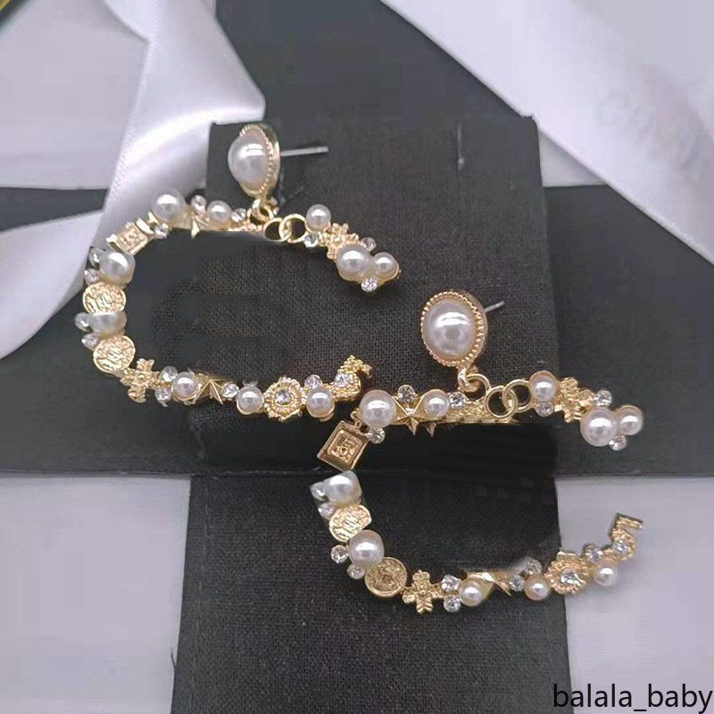 Mode marque de luxe doux perle creux boucles d'oreilles pour femmes filles mode cristal Diomond bijoux de mariage