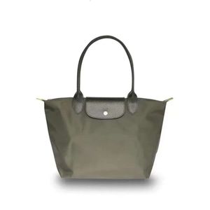 Mode marques de luxe dames sac à main tendance Simple décontracté grande capacité boulette en forme de sac à bandoulière en Nylon