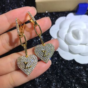 Boucles d'oreilles de créateurs de luxe à la mode, cuivre en or 18 carats, zircon classique, pendentif en forme de cœur, boucles d'oreilles à breloques pour femmes, fête de mariage, cadeaux de haute qualité