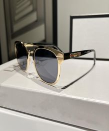 Mode luxe designer piloot zonnebril voor mannen dames ronde cycloon metalen bloem gouden zonnebril glazen buiten antiultraviolet2283061