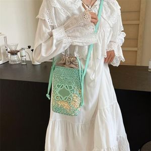 Mode luxe avondtas Franse rattan geweven tas familie kustvakantie handgeweven mobiele telefoon tas ontwerper vrouwelijke schoudergeslagen tas