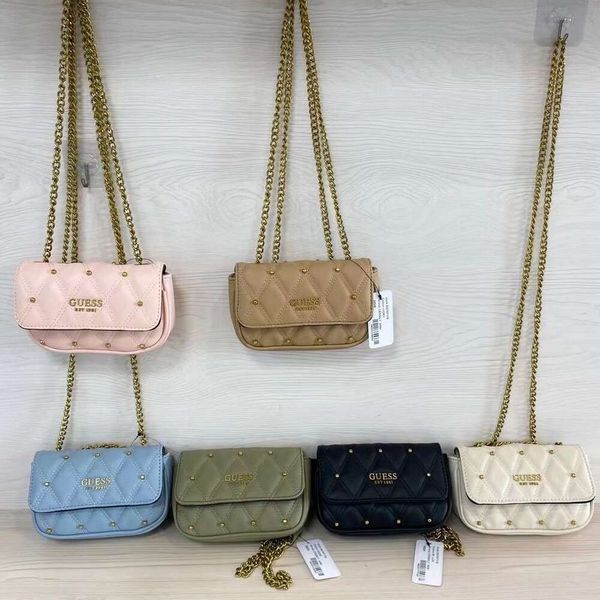 Moda Paquete cruzado de moda de lujo Tienda Envío gratis Gus Home Remache Nuevo bolso para mujer Cartera europea y americana de color sólido Cadena de rejilla de diamantes Un hombro Pequeño