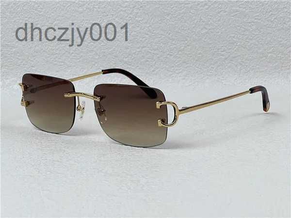 Moda Gafas de sol de lujo Vintage Hombres Diseño Sin marco Forma cuadrada Gafas Uv400 Lente de color claro dorado 0104 con estuche Buffs Multi 7W1H