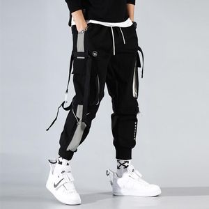 Moda hombre cintas Color bloque negro bolsillo Cargo pantalones Harem Joggers Harajuku pantalón de chándal Hip Hop pantalones de chándal
