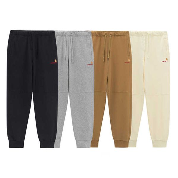 Pantalones de moda para hombres y mujeres Herramientas Marca Carhart Nuevo Otoño Invierno Oro con letras Bordado Terry Sanitario Cerrar pierna Casual Ins Juventud V86g