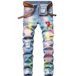 Mode hommes couleur peint imprimé Denim Jeans décontracté Badge trous déchiré pantalon Patchwork Stretch pantalon pour hommes