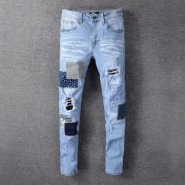 Pantalones largos de moda para hombre Desiger alta calidad Patchworl Ripped Hole Demin pantalones Streetwear Jeans para Men291a
