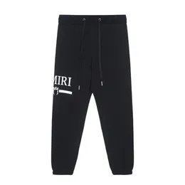 Pantalones de diseño para hombres de moda Hombres Mujeres Pantalones de pantalones de color sólido Pantalones de movimiento de hip hop para joggers casuales masculinos tamaño M-xxl