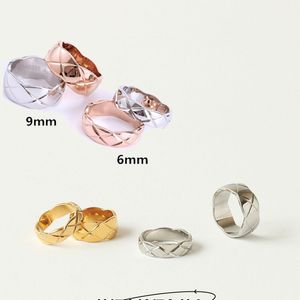 Fashion Designer Ring Ring Gold Rings Band para mujeres Especificaciones de acero de titanio de patrón cruzado ancho y estrecho chapado en joyas de lujo de oro de 18k 6 mm 9 mm
