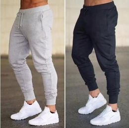 Mode heren joggers merk casual brak fitness dames sportkleding tracksuit bodems magere joggingbroek broek zwart grijze sportscholen jogger track broek