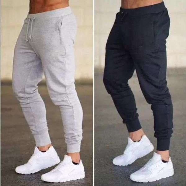 Mode Hommes Joggers Marque Pantalon Décontracté Fitness Femmes Sportswear Survêtement Bas Pantalon De Survêtement Maigre Pantalon Noir Gris Gymnases Jogger Pantalon De Survêtement