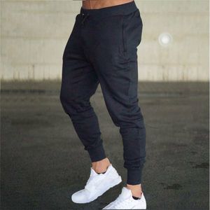 Mode hommes joggeurs pantalons décontractés Fitness vêtements de sport pour hommes survêtement bas pantalons de survêtement maigres pantalons gymnases joggeurs pantalons de survêtement WE