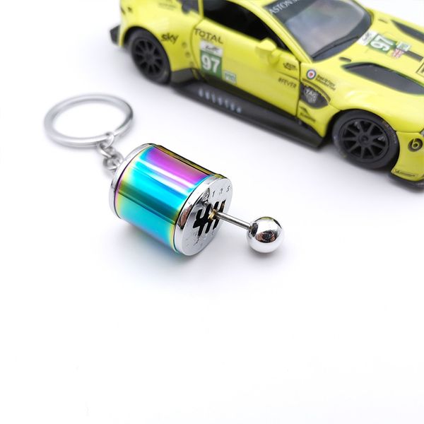 Llavero de diseñador de metal de moda, proceso de chapado de brillo de coche modificado, cubo de cambio de coche, modelo de amortiguador Turbo, Mini llavero