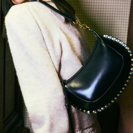 Fashion Moon Bagwomens Cowhide Saddle Bag Rivet Decoratie Armpit Luxe designer schouder dames handtas winkelen 240507