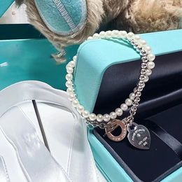 Collier de mode Designer Retour au pendentif Bijoux en forme de coeur Chaînes à deux étages avec colliers de perles pour femmes fête or rose platine